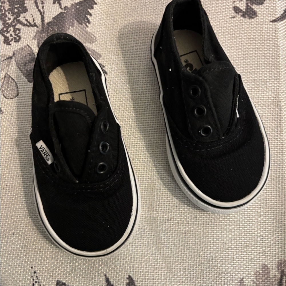 SOLD. 
Vans Black Low-Top Canvas Sneakers